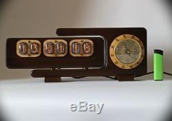 Nixie Tube Clock 6x with barometer presented in 2 colors in an exclusive case