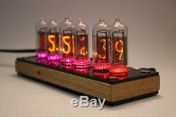 Nixie tube clock include IN-14 tubes and wooden oak enclosure and black cover