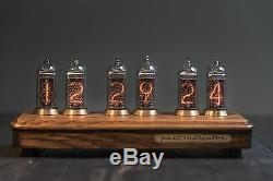 Past Indicator Nixie tube clock in oak and brass case